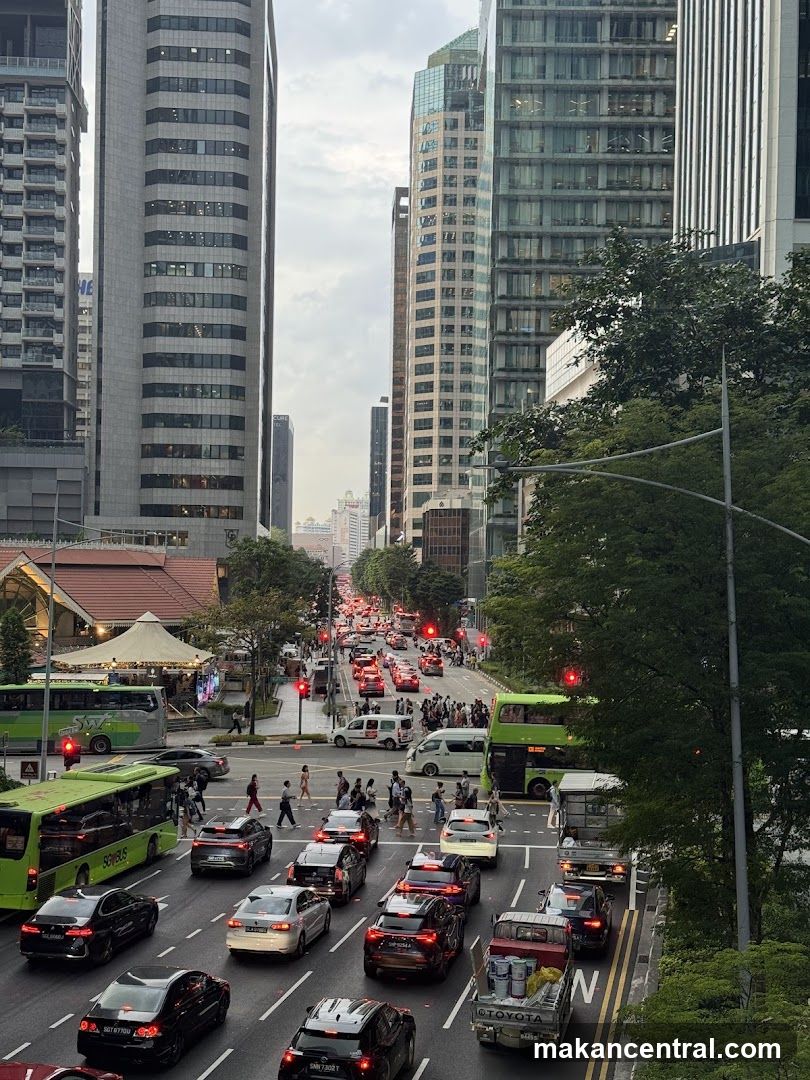 Busy City Street with Traffic and Pedestrians