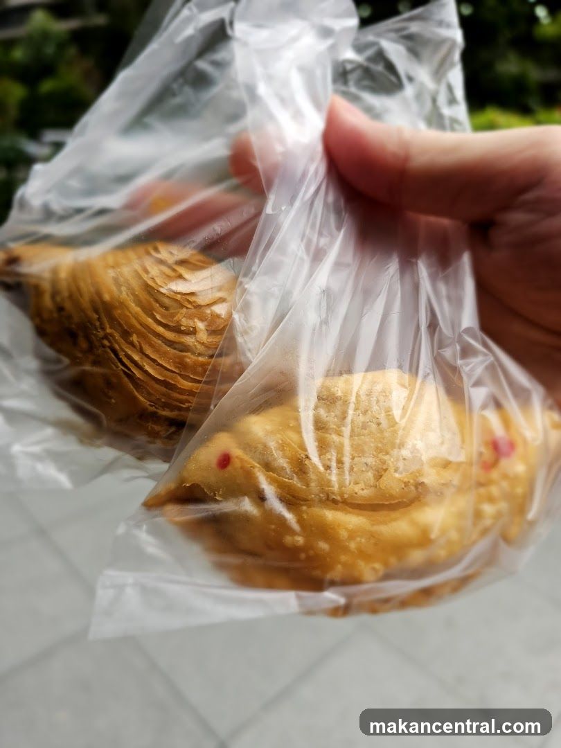 Two pastries in a plastic bag