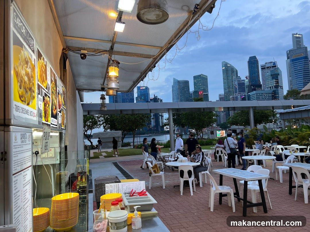 Outdoor dining area with city skyline view