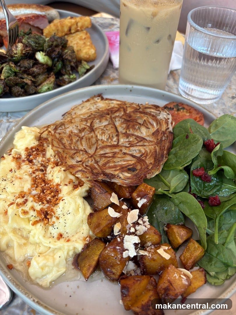 Scrambled Eggs with Hash Browns and Salad