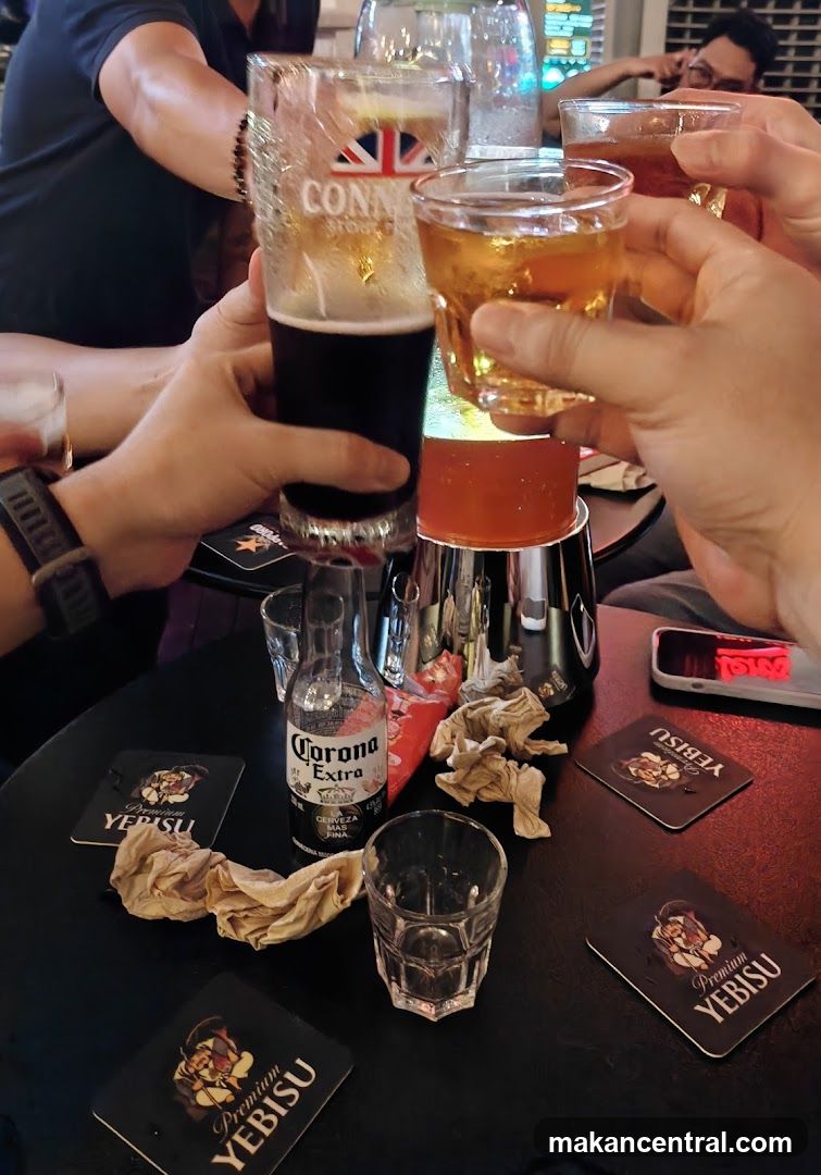 Friends toasting drinks at a bar