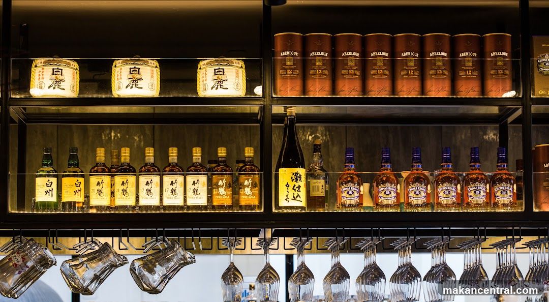 Bottles and Glasses on Shelves