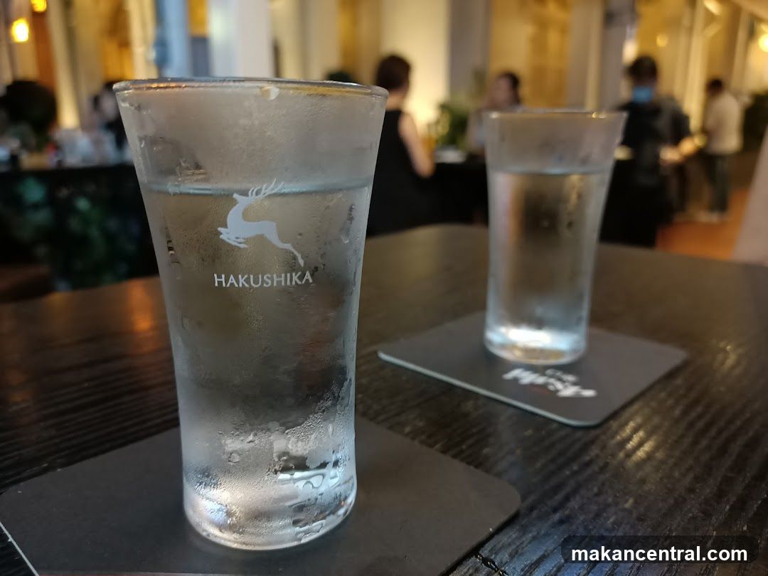 Two glasses of sake on a table