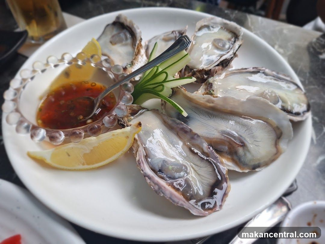 Oysters with Lemon and Sauce