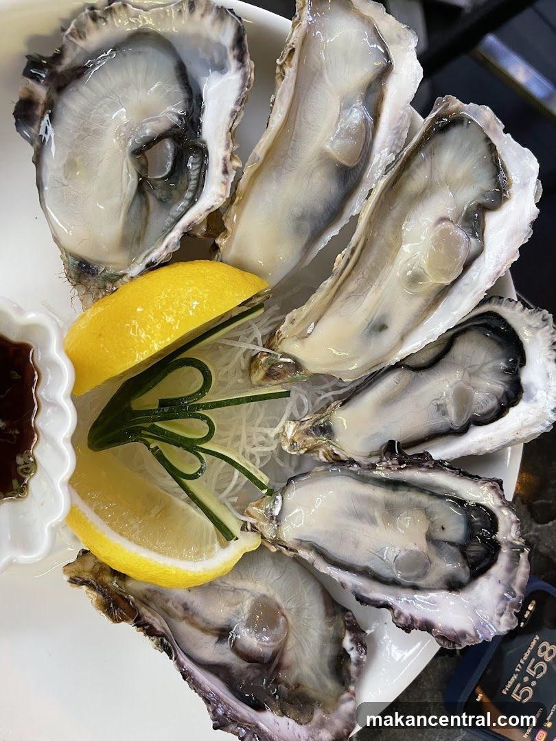 Oysters with Lemon and Dipping Sauce