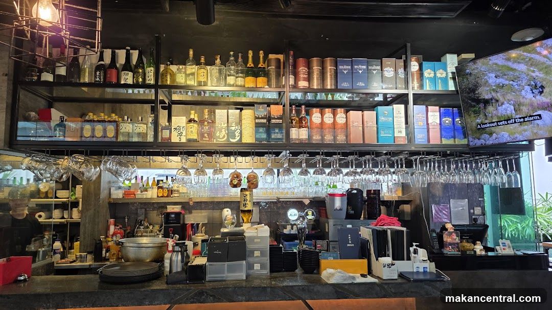 Bar Interior with Shelves of Bottles and Glasses