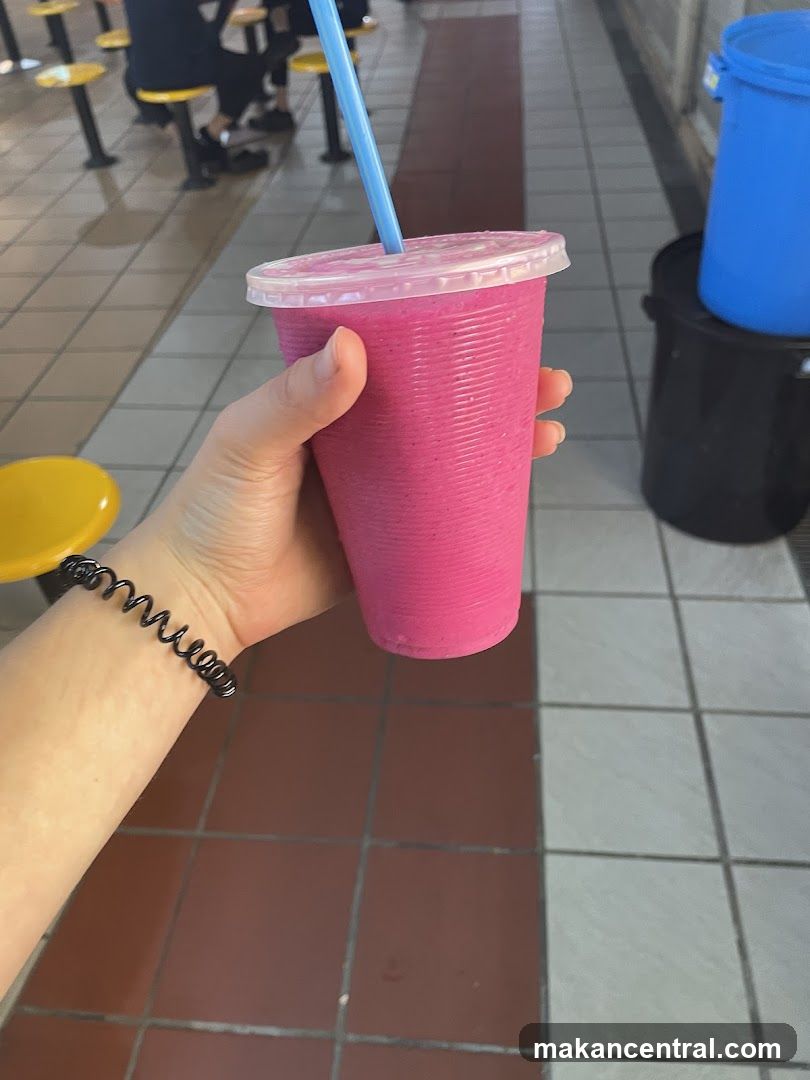 Pink Smoothie in a Plastic Cup