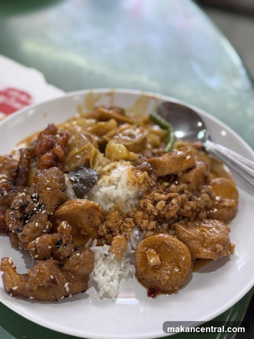 Plate of Rice with Various Toppings