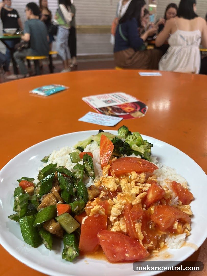 Food on a plate with people in the background