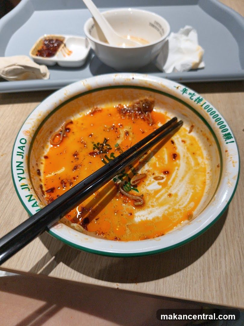 Partially Eaten Bowl of Noodles