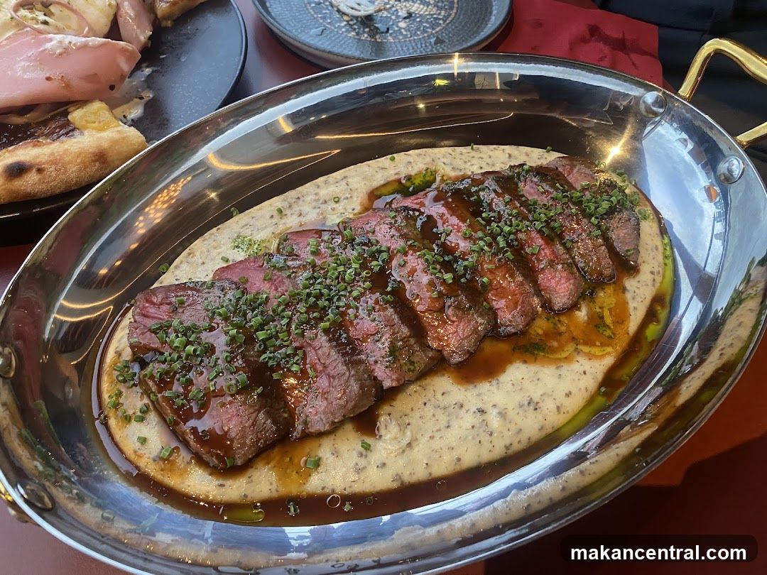 Sliced Steak with Sauce and Garnish