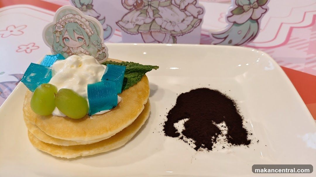 Pancakes with Whipped Cream and Grapes