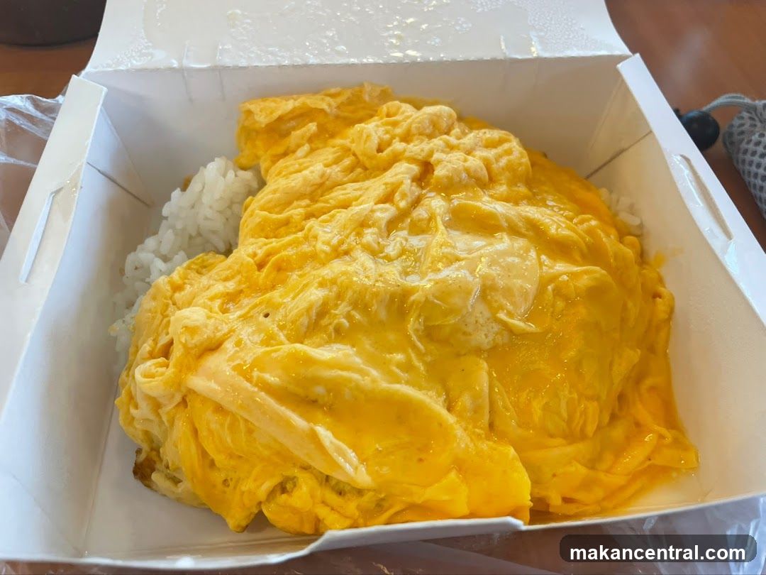 Omurice in a takeout box