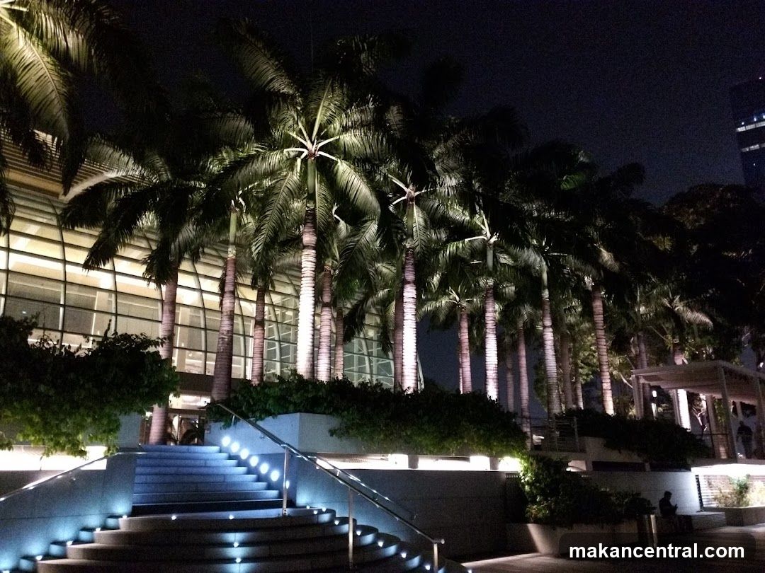 Palm Trees and Modern Architecture at Night