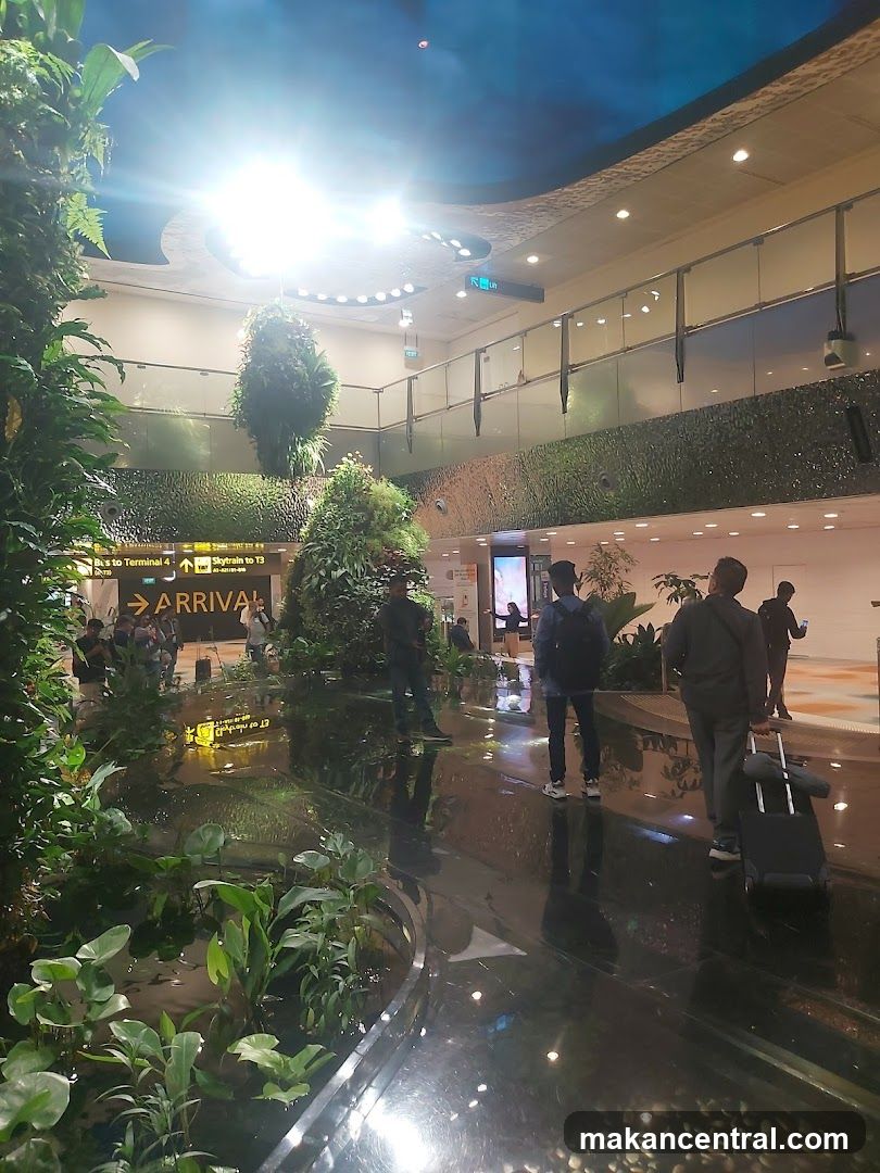 Indoor Garden with People and Signage