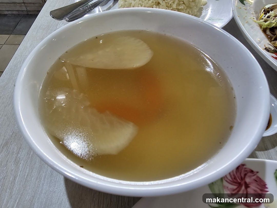 Bowl of Broth with Sliced Radish