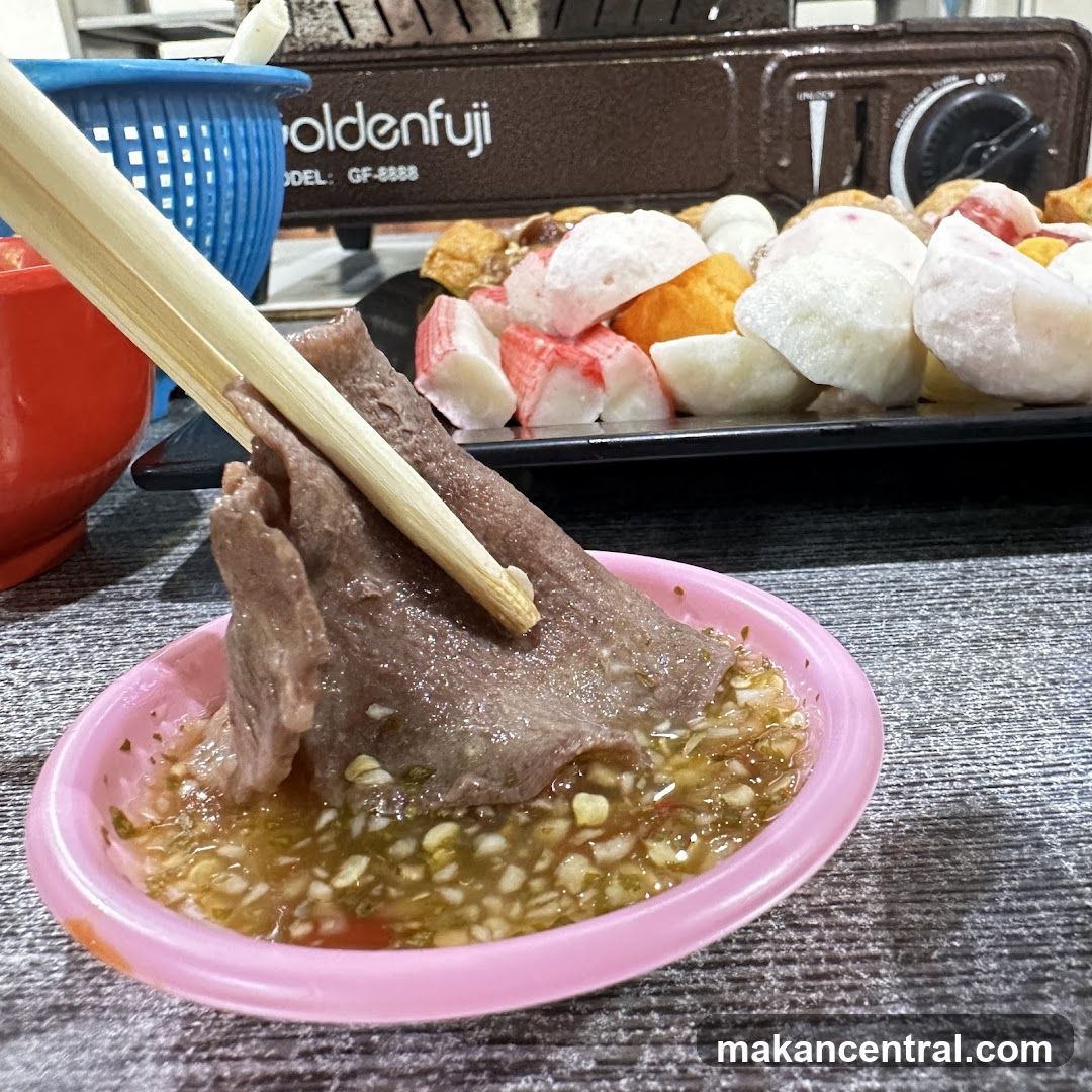 Dipping Meat in Sauce