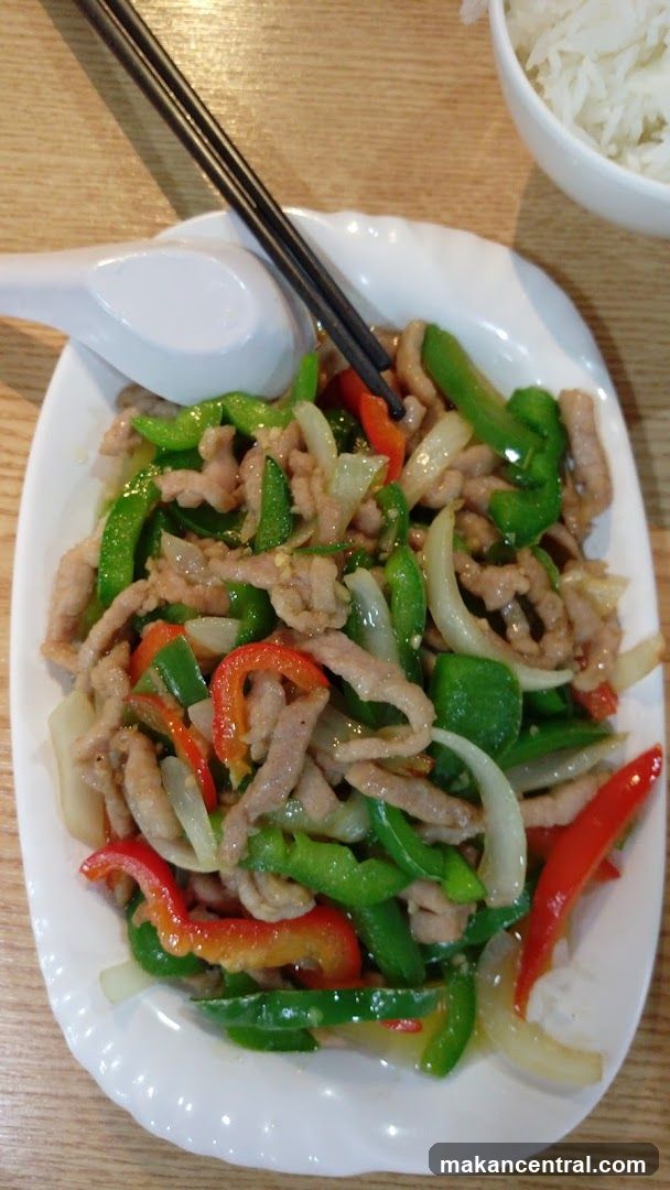 Pork Stir-fry with Peppers and Onions