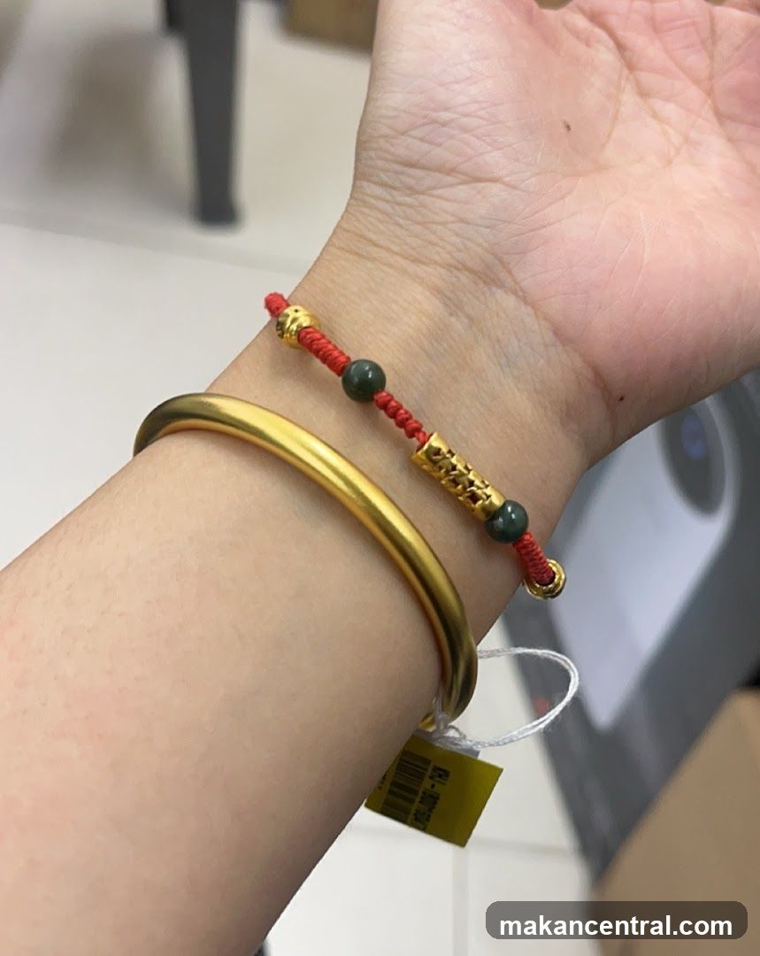 Gold Bangle and Red String Bracelet