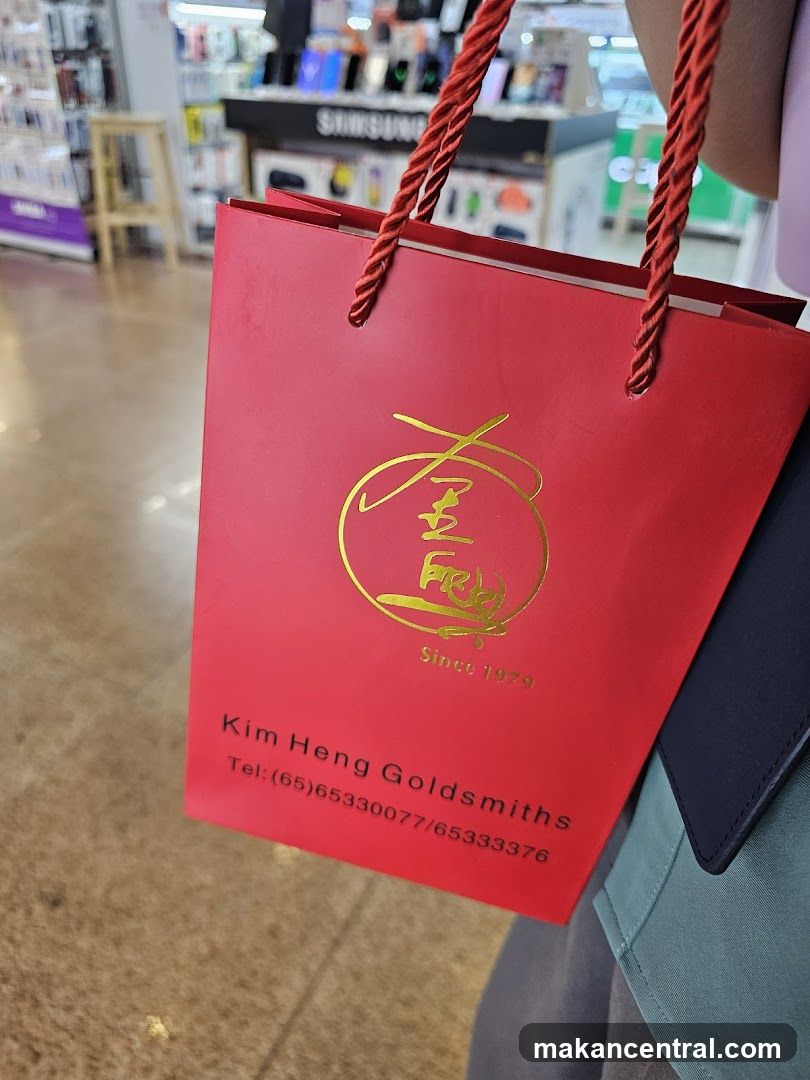 Red Gift Bag with Goldsmiths Logo