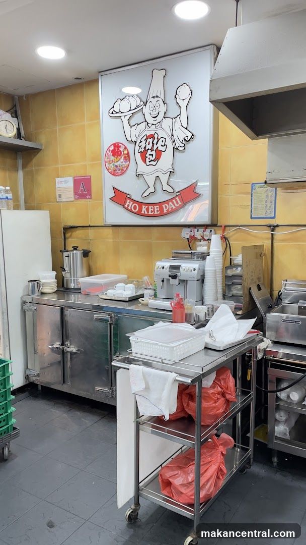 Kitchen counter with coffee machine and logo