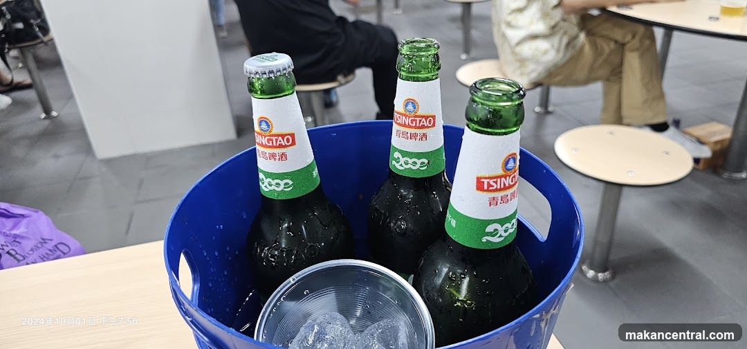 Tsingtao Beer Bottles in Ice Bucket