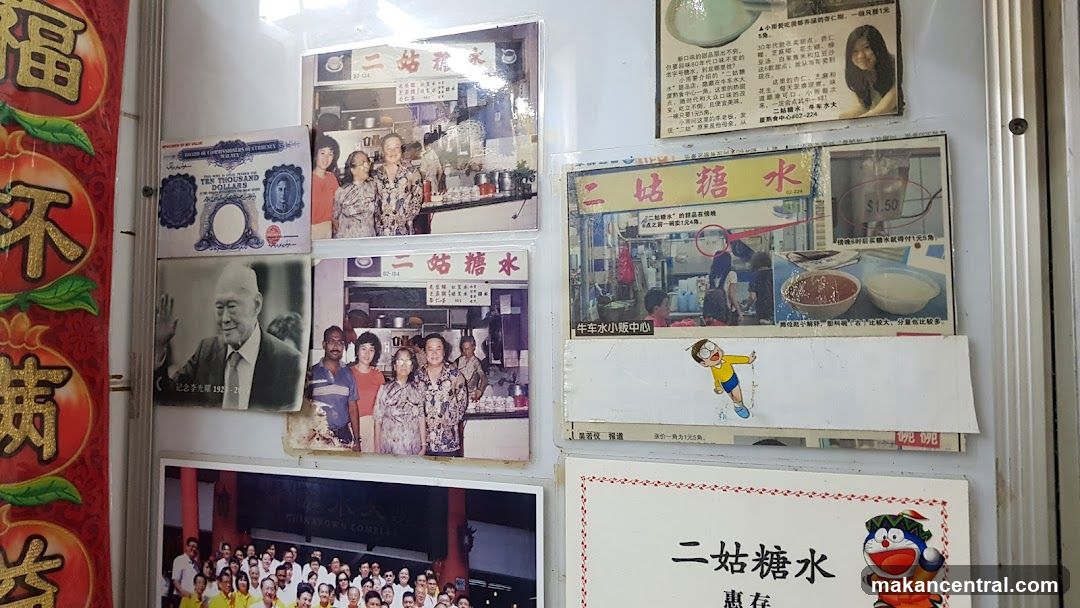 Newspaper clippings and photos on a wall