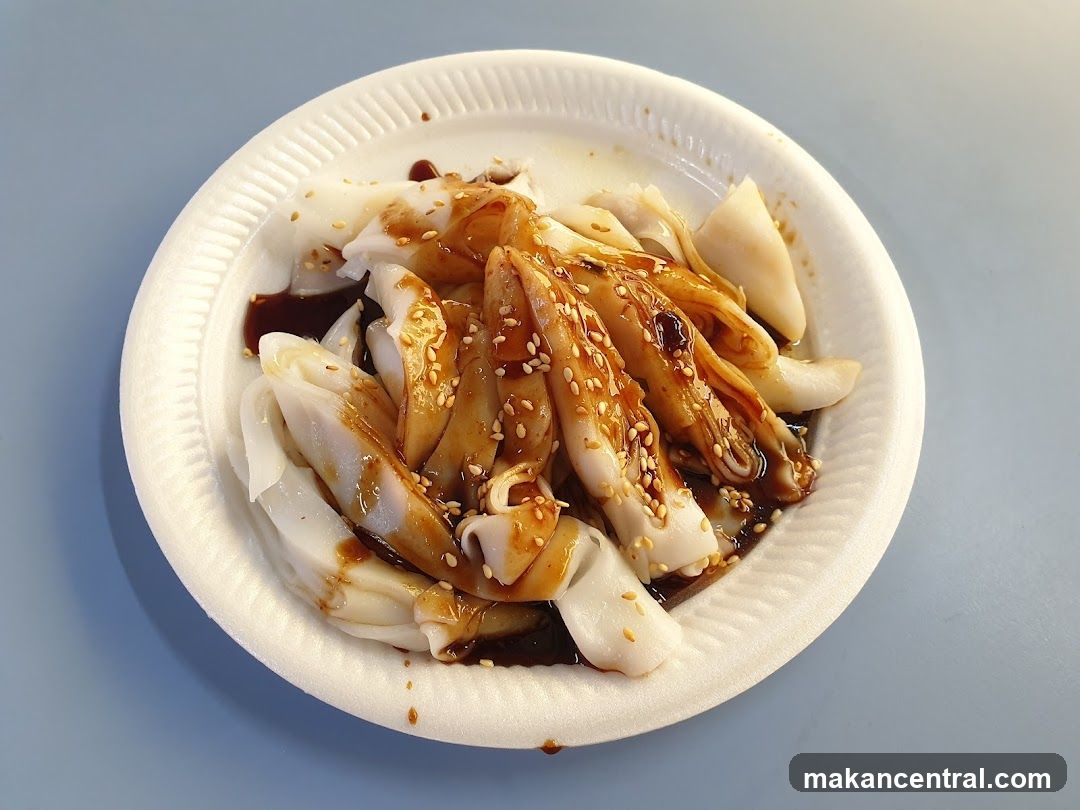 Cheung Fun with Sauce and Sesame Seeds