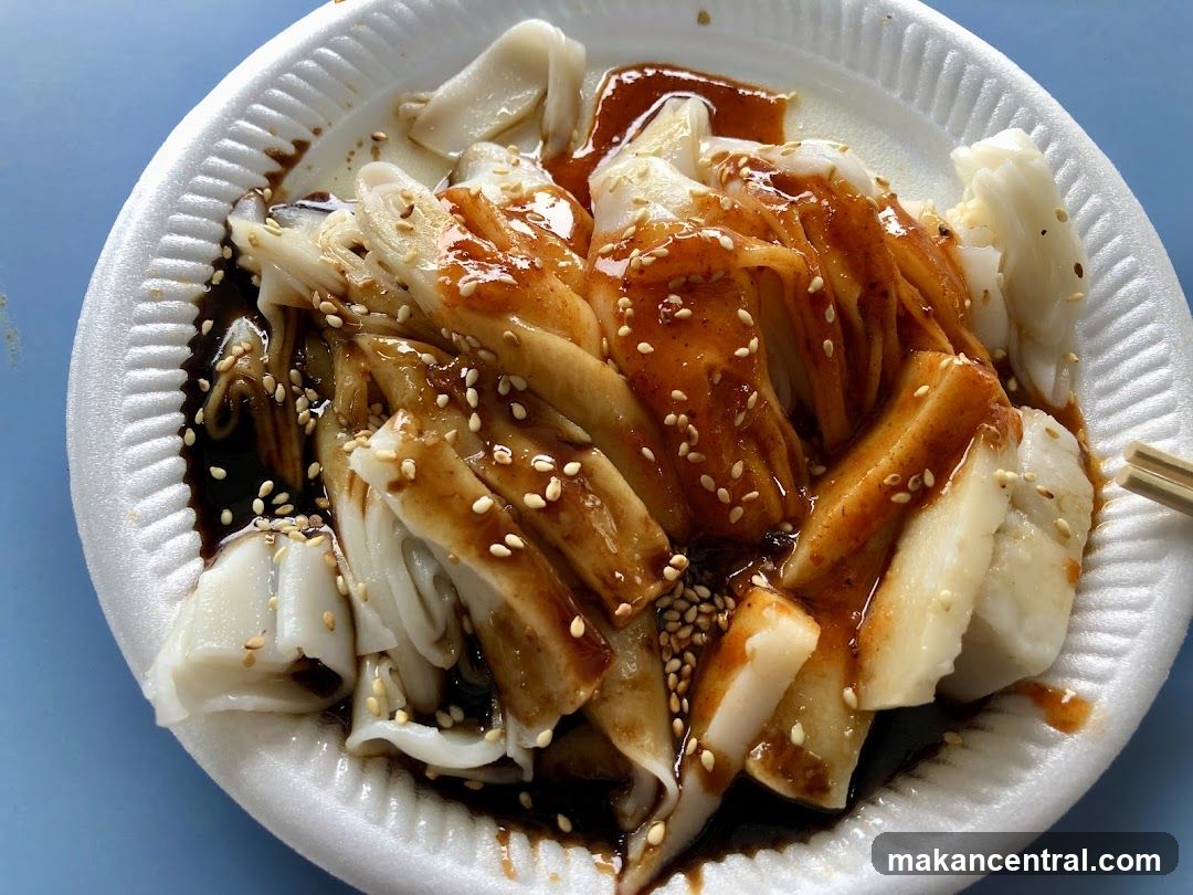 Cheung Fun with Sauce and Sesame Seeds