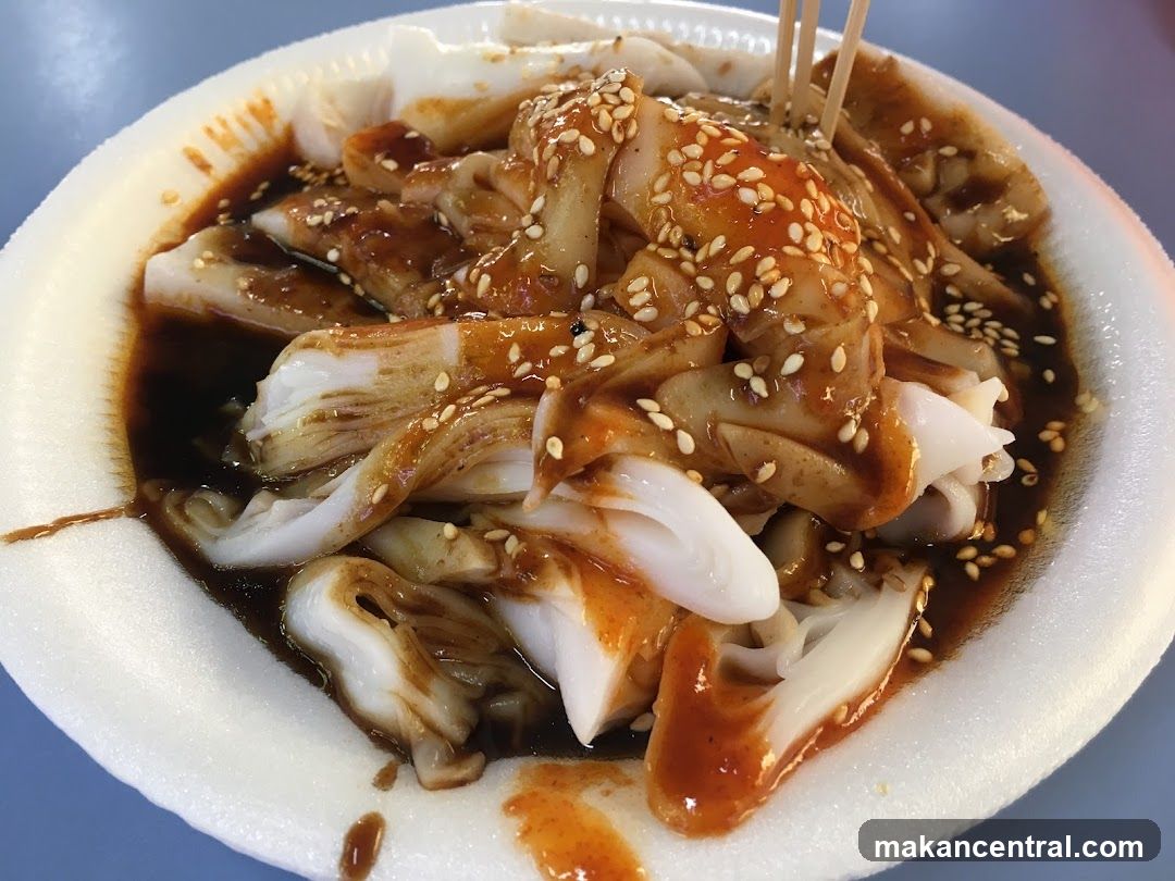Cheung Fun with Sauce and Sesame Seeds