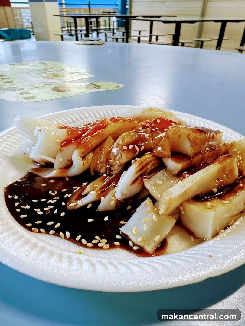 Chee Cheong Fun with Sauce and Sesame Seeds