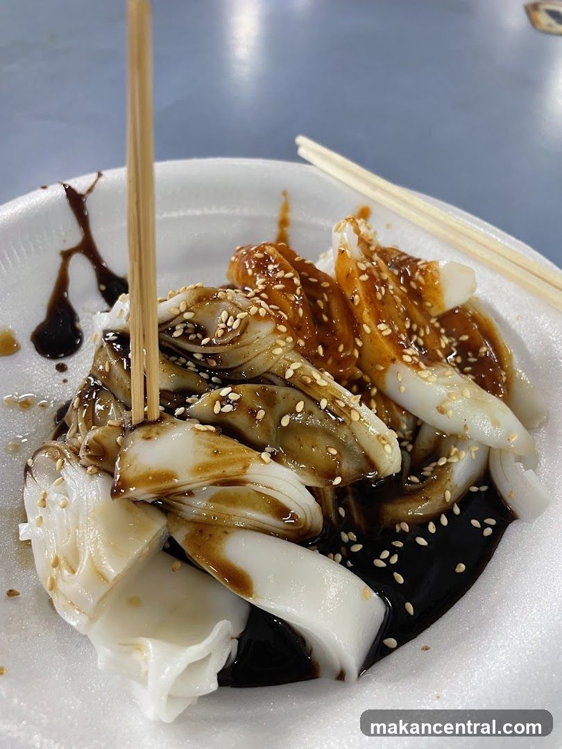 Cheung Fun with Sauce and Sesame Seeds