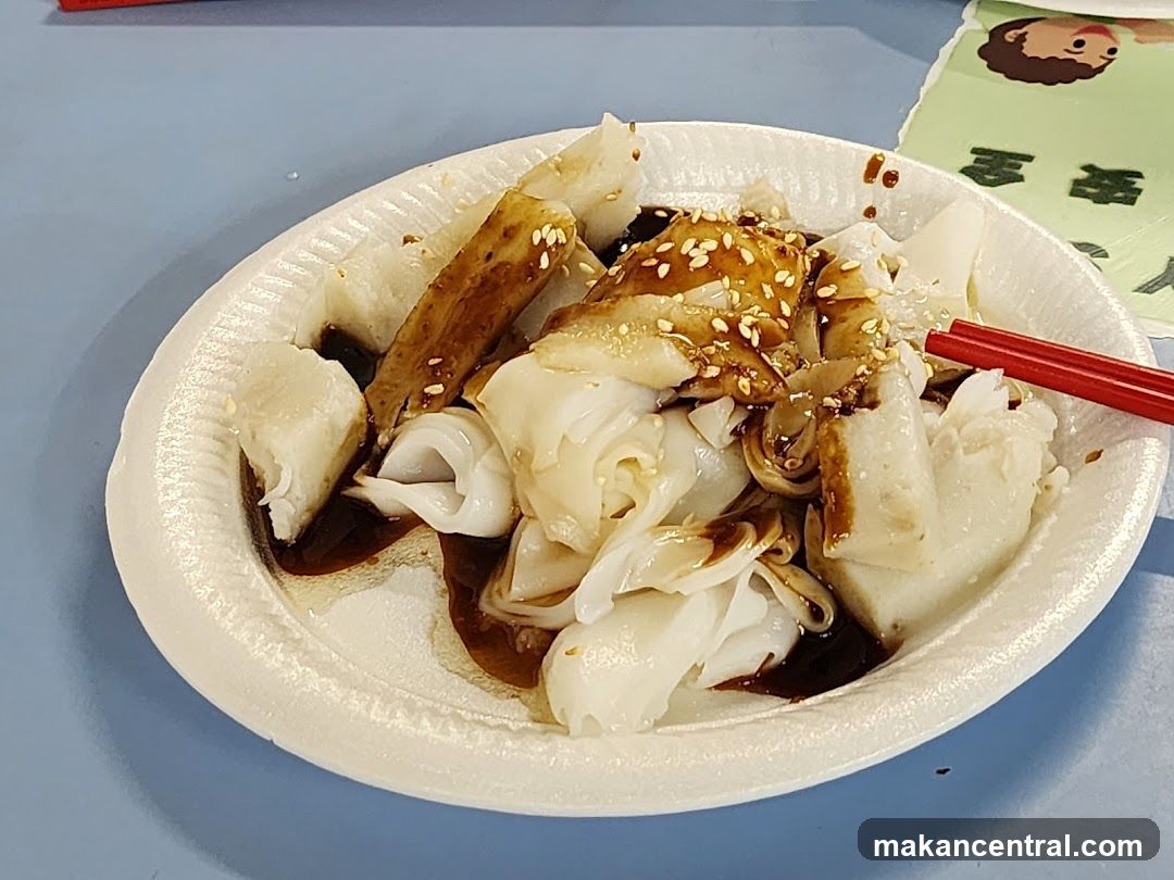 Chee Cheong Fun with Sesame Seeds and Sauce