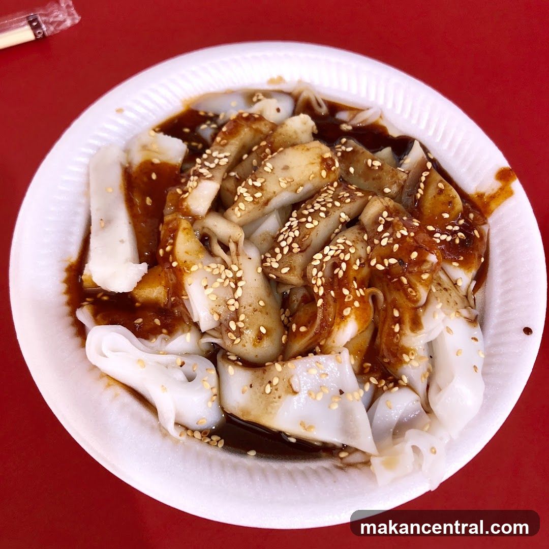 Cheung Fun with Sauce and Sesame Seeds