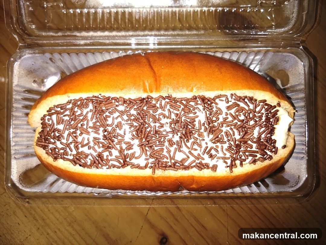 Cream-filled pastry with chocolate sprinkles