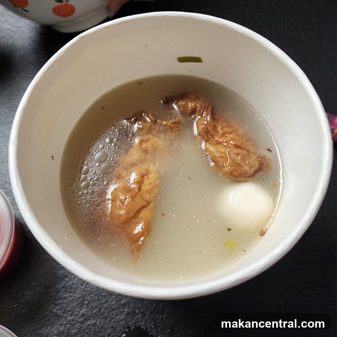 Bowl of Soup with Meat and Dumpling