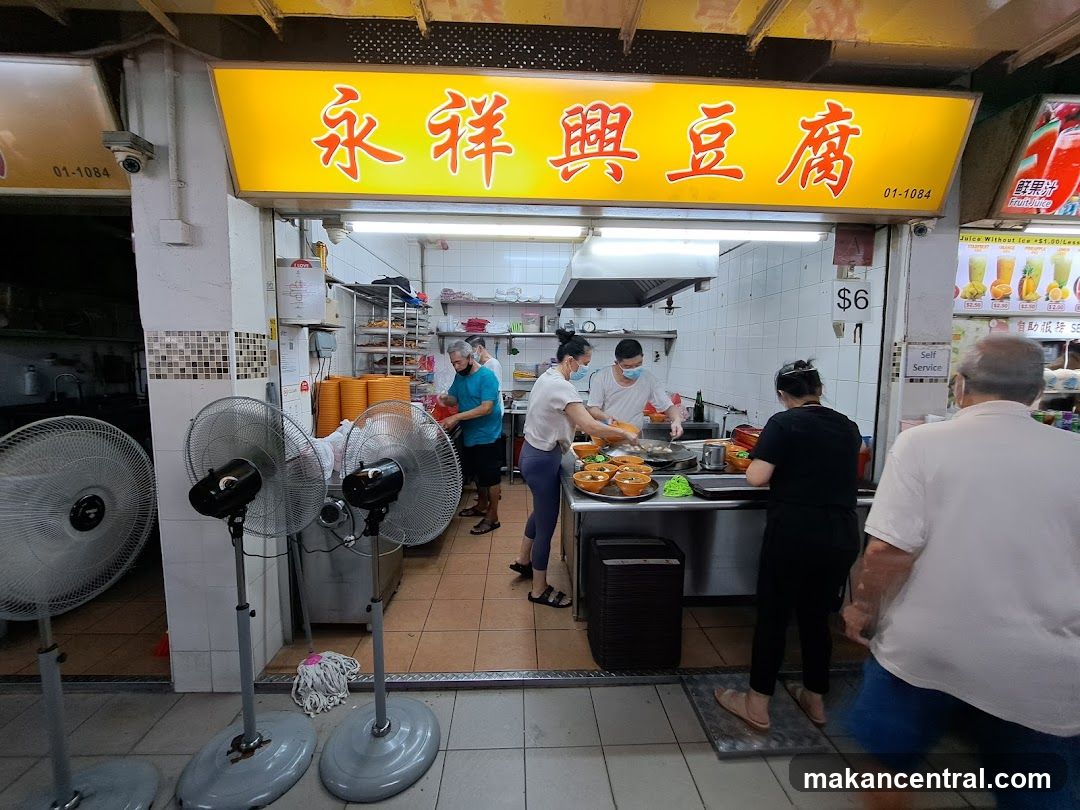 Food Stall with Staff Preparing Food