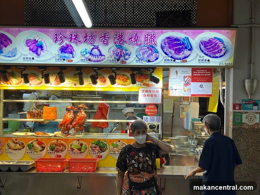 Food Stall with Roasted Meats and Noodles