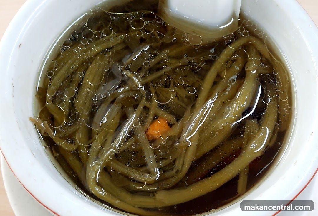 Bowl of Soup with Greens