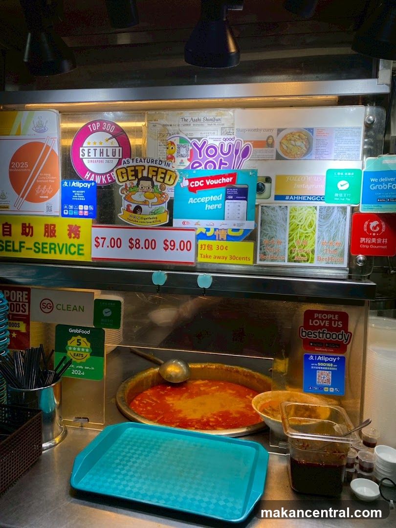Food stall with various signs and food