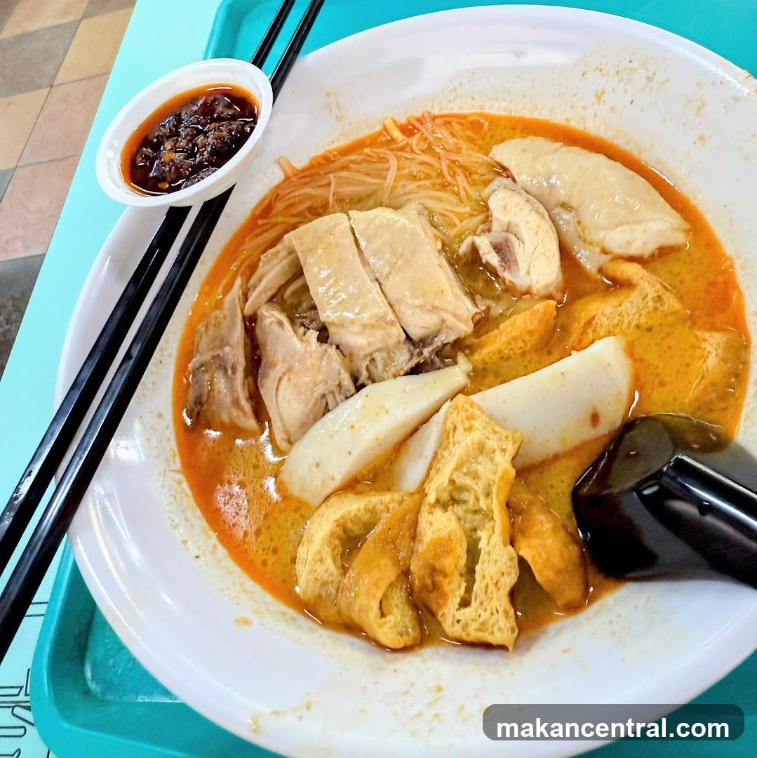 Curry Noodles with Chicken and Fish Cake