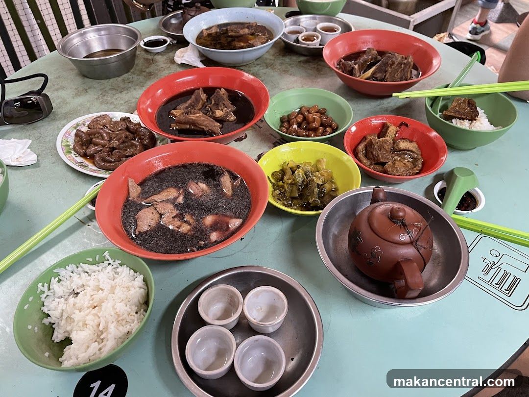 Table with various dishes and teapot