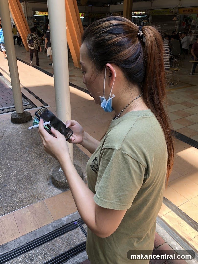 Woman on phone with cigarette