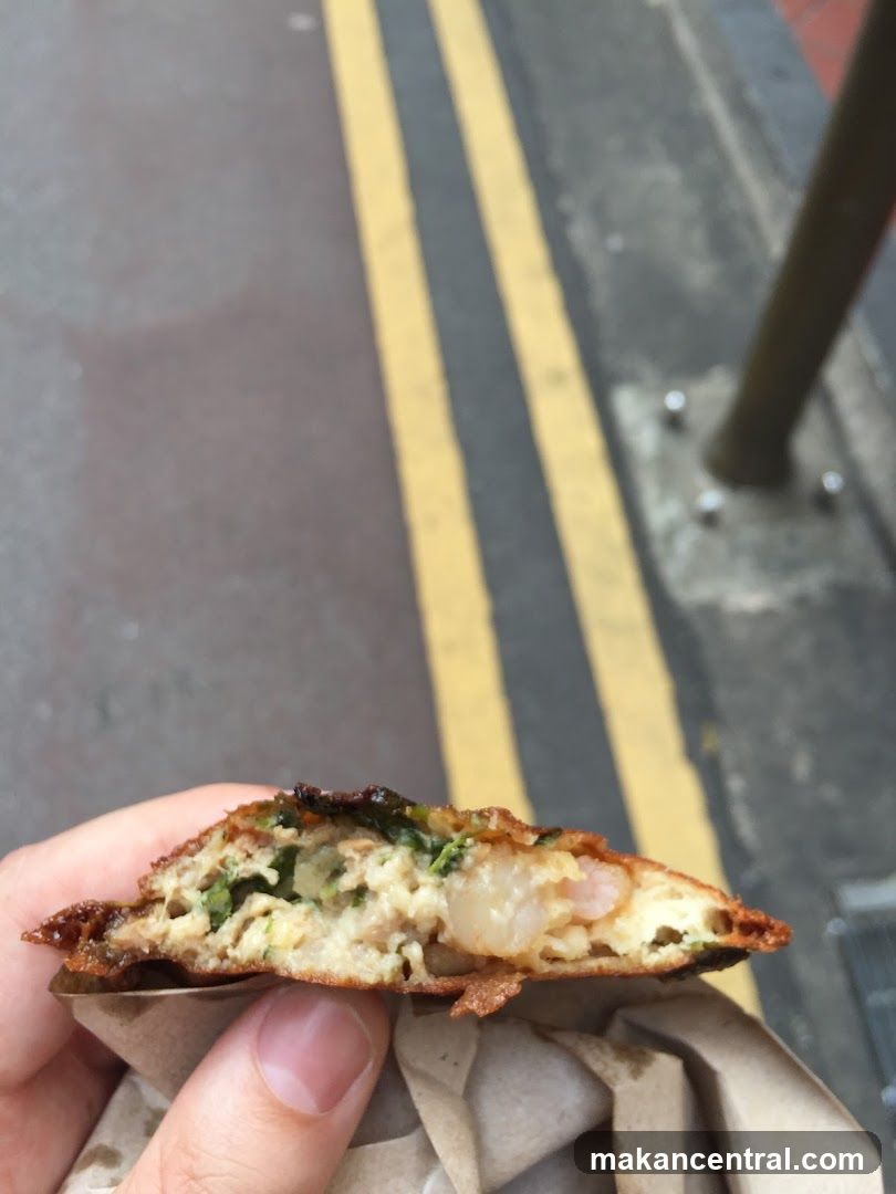 Close-up of a savory pancake with shrimp