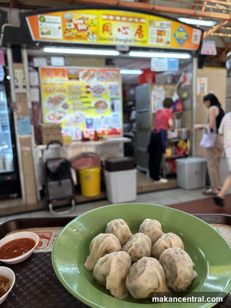 Dumplings and Sauces with Hawker Stall in Background