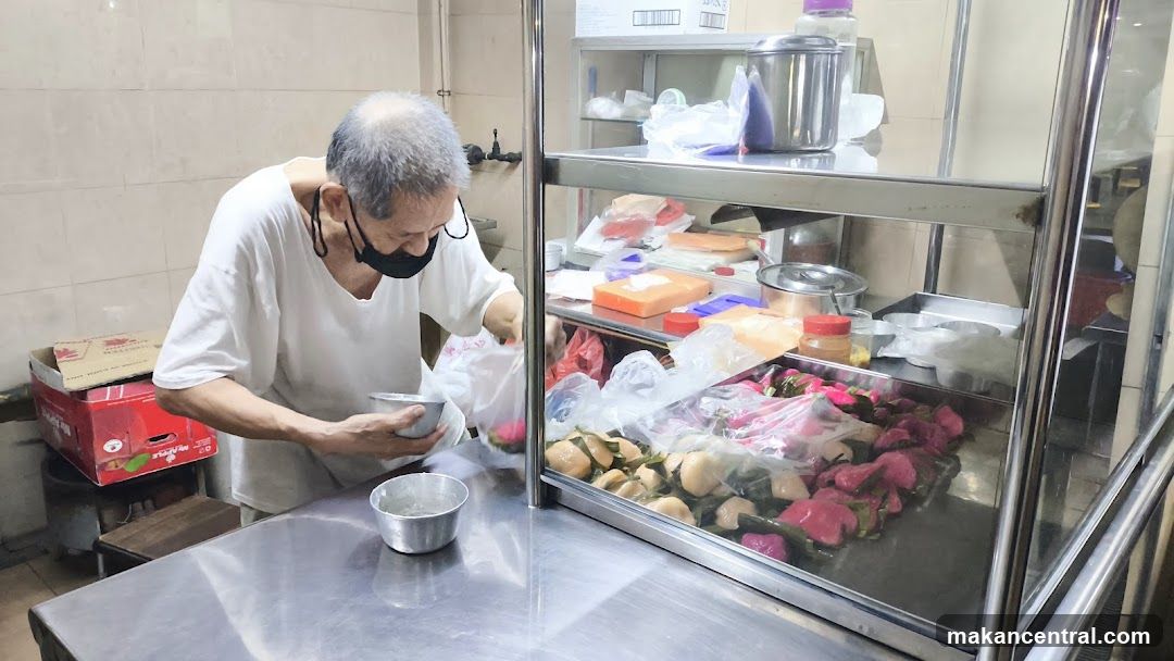 Food Stall Vendor Preparing Food