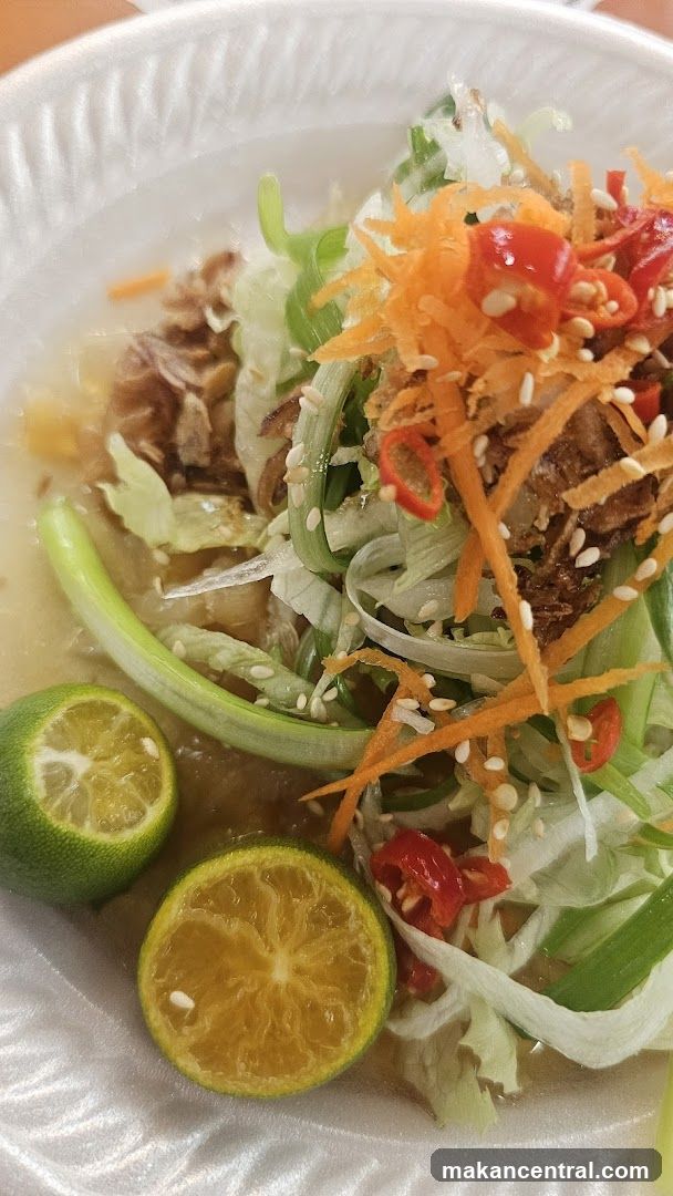 Bowl of food with lime wedges