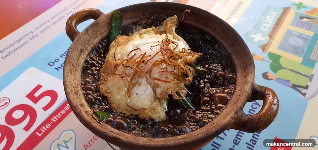 Clay Pot Dish with Fried Egg