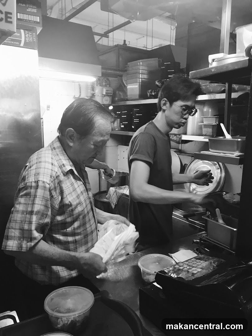 Kitchen Staff Preparing Food