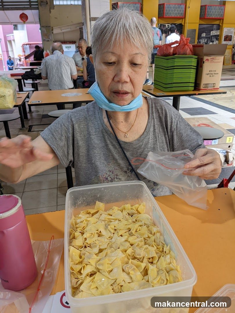 Woman with Wonton Wrappers